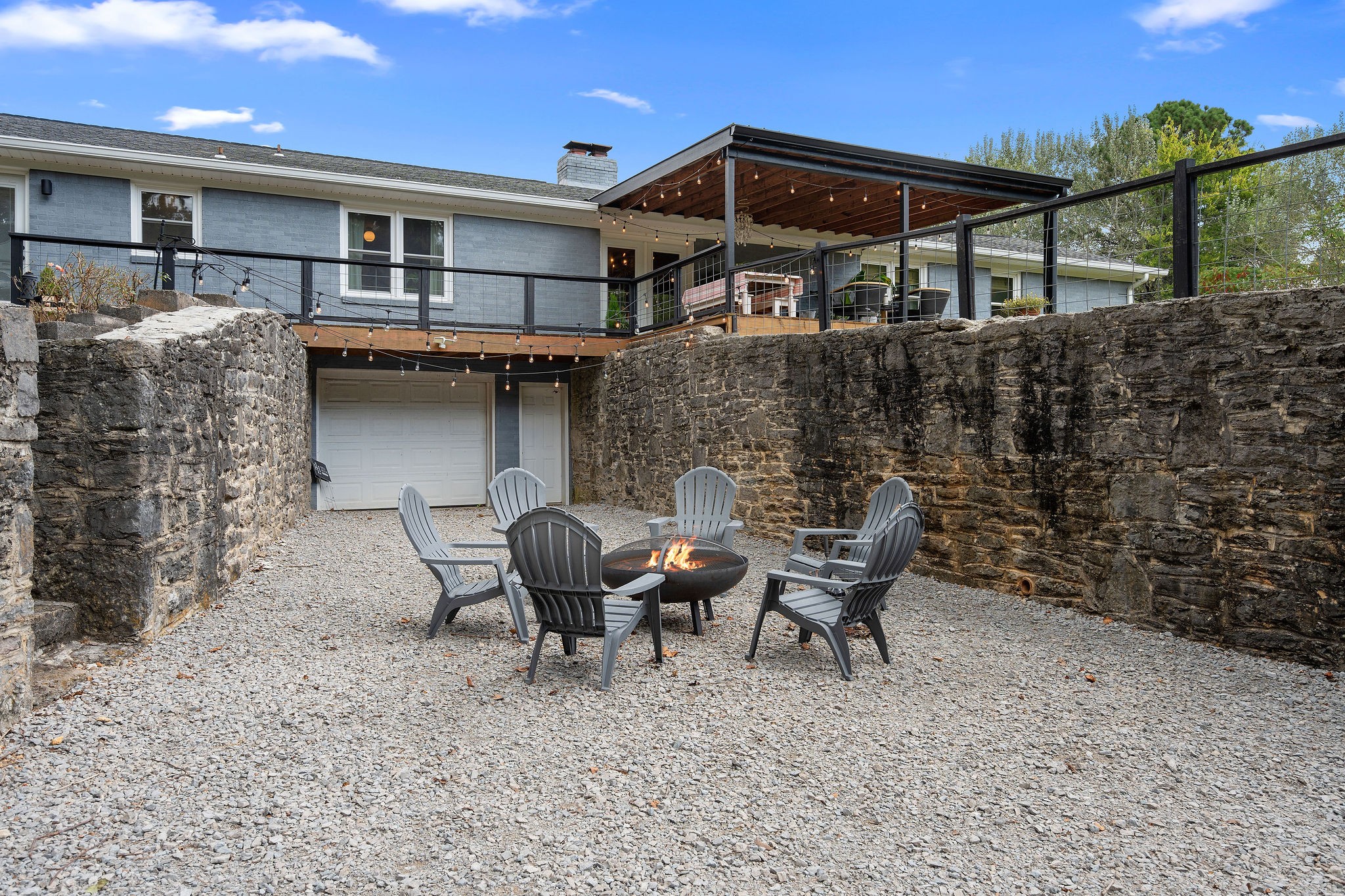 2337 Les Robinson Road Columbia, TN 38401 - Photo 32 of 35 a view of a patio with table and chairs and wooden fence