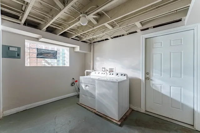 a utility room with dryer and washer