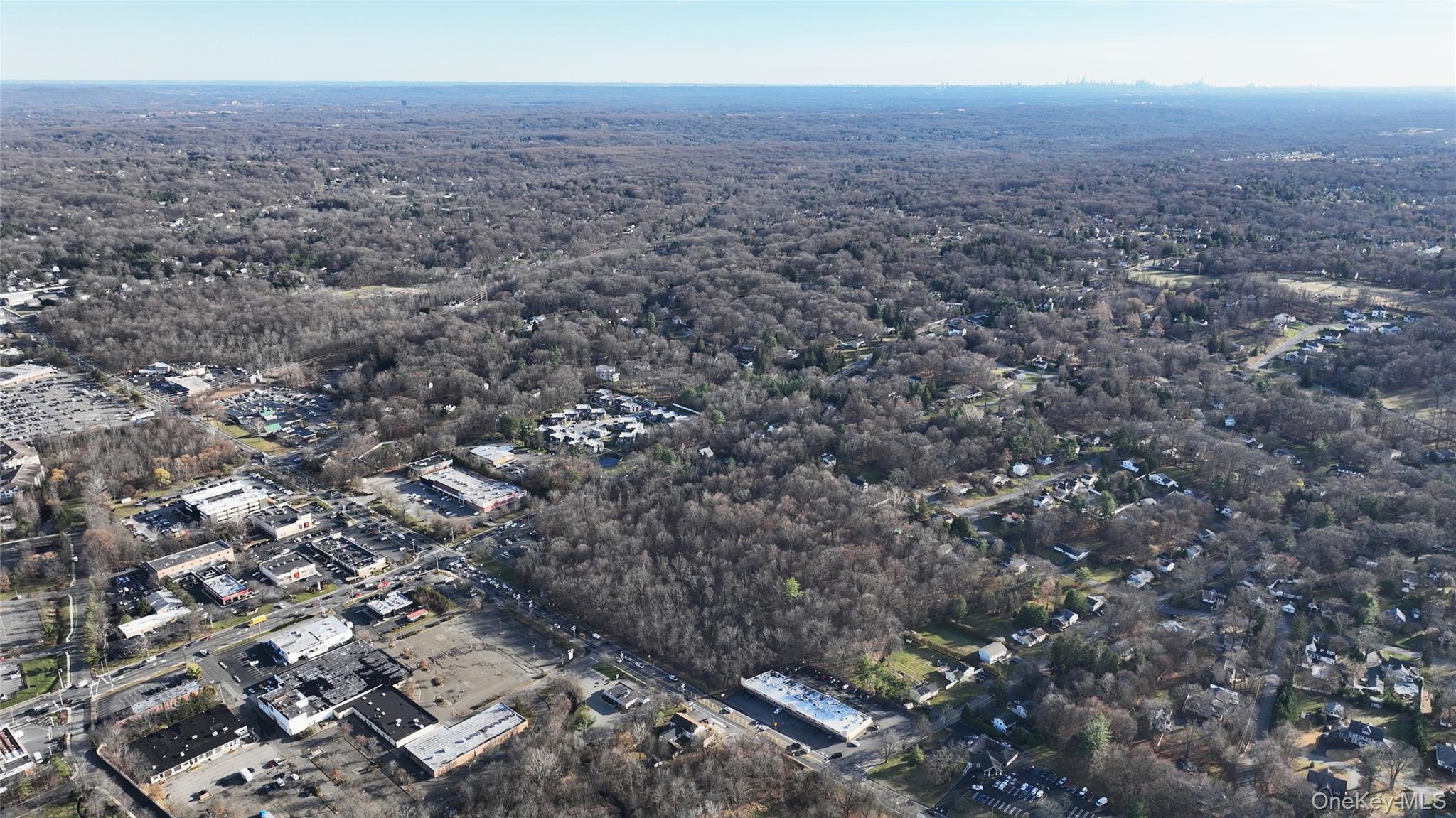 1 South Airmont Road Suffern, NY 10901 - Photo 14 of 16 an aerial view of house with yard and mountain view in back