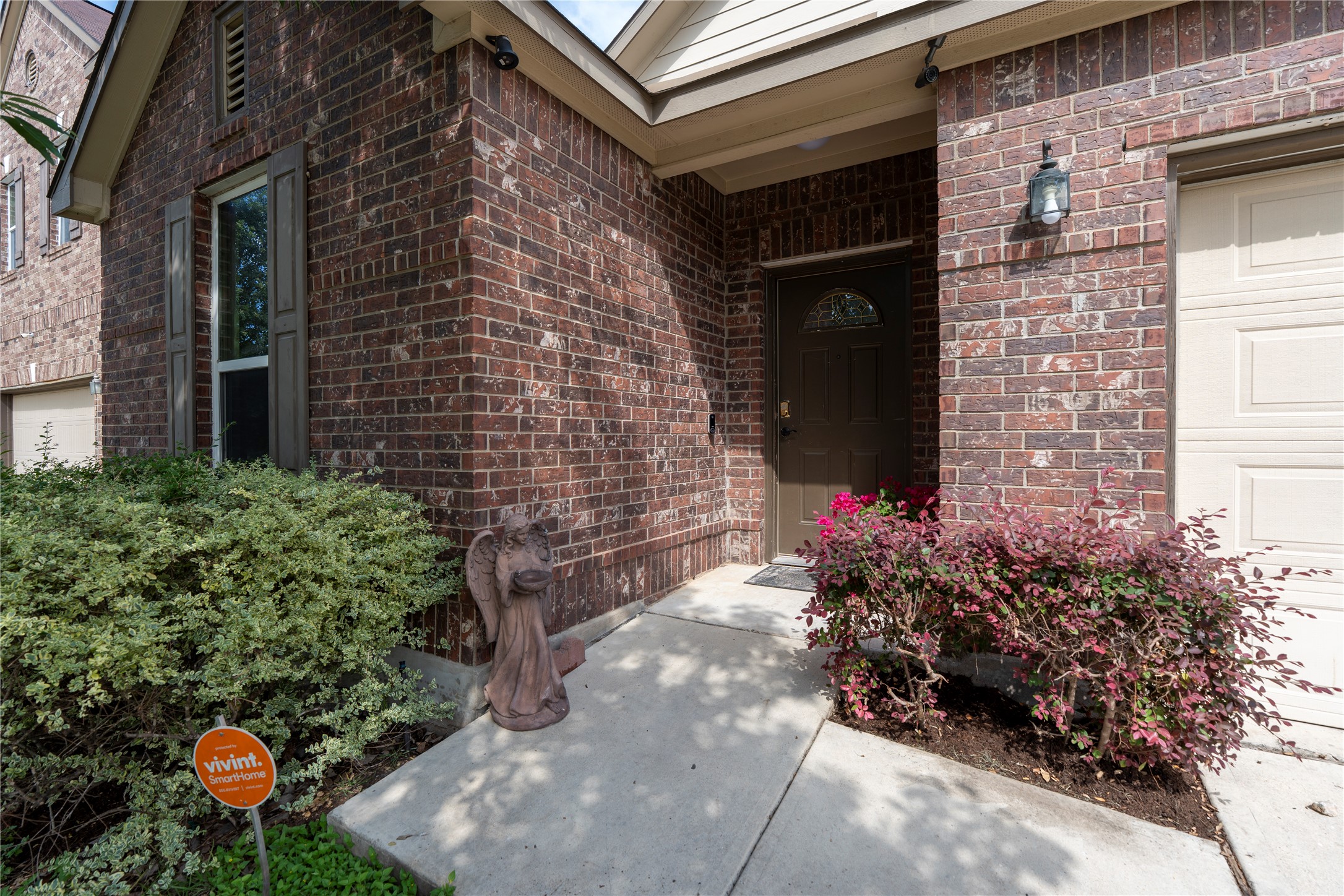 8613 Capitol View Drive Austin, TX 78747 - Photo 2 of 33 A well-maintained brick exterior and mature landscaping offer inviting curb appeal.