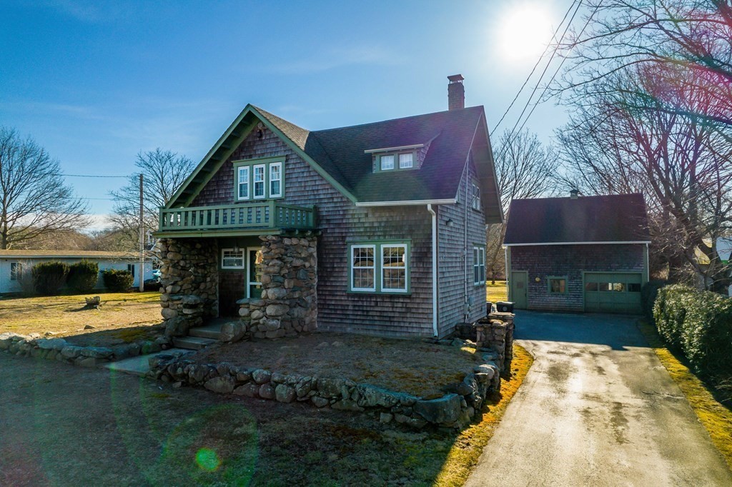 236 Russells Mills Road Dartmouth, MA 02748 - Photo 2 of 30 a front view of a house with garden