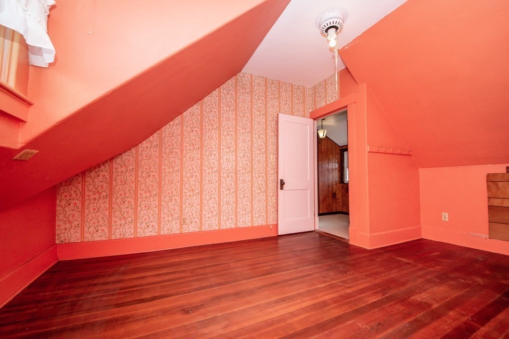 236 Russells Mills Road Dartmouth, MA 02748 - Photo 24 of 30 a view of a big room with wooden floor