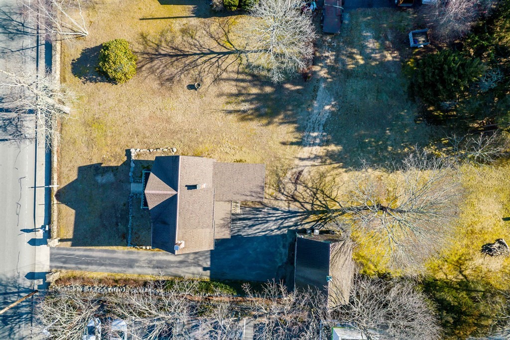 236 Russells Mills Road Dartmouth, MA 02748 - Photo 29 of 30 a view of a house with a yard next to a lake