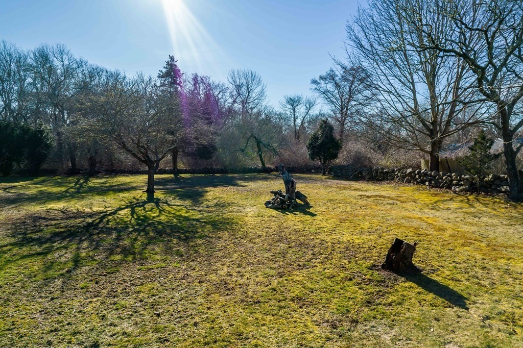 236 Russells Mills Road Dartmouth, MA 02748 - Photo 8 of 30 a view of a swimming pool with a yard