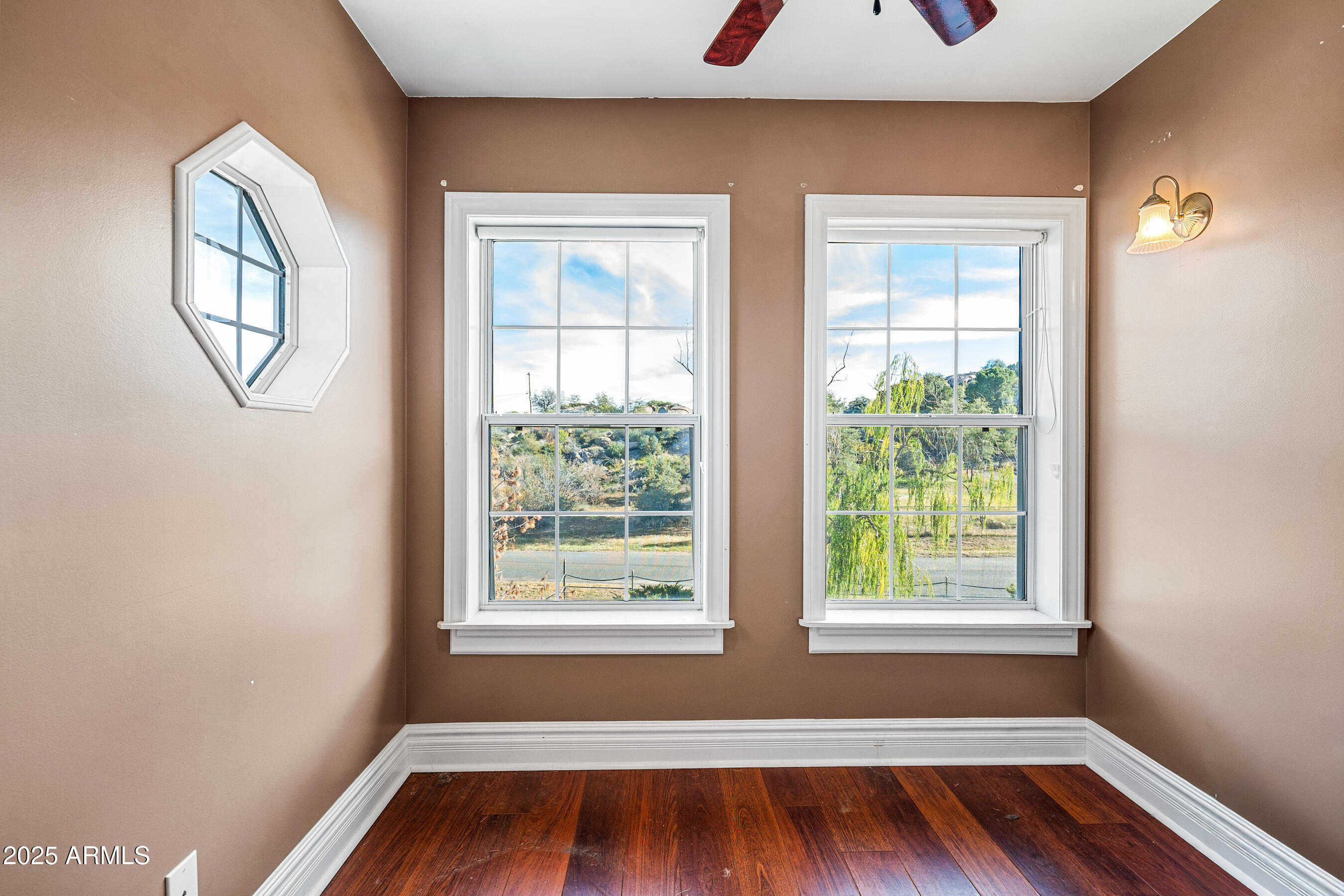 17288 Foothill Road Yarnell, AZ 85362 - Photo 43 of 79 a view of wooden floor and windows in a room