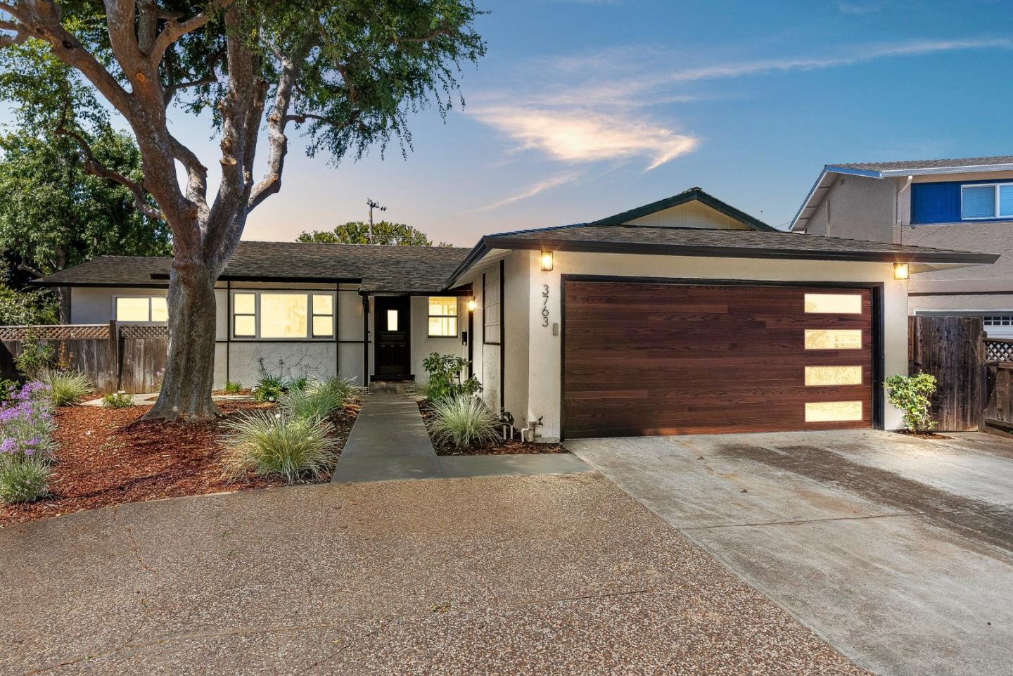 3763 Xavier Court Campbell, CA 95008 - Photo 1 of 41 a front view of a house with garden