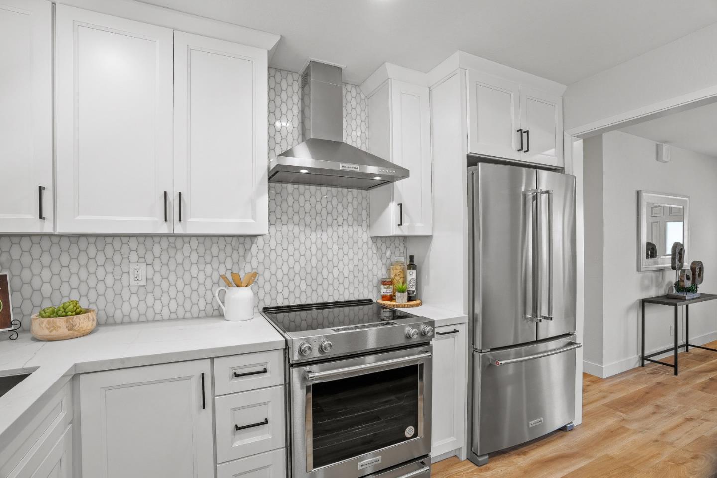 3763 Xavier Court Campbell, CA 95008 - Photo 11 of 41 a kitchen with stainless steel appliances a stove refrigerator and cabinets