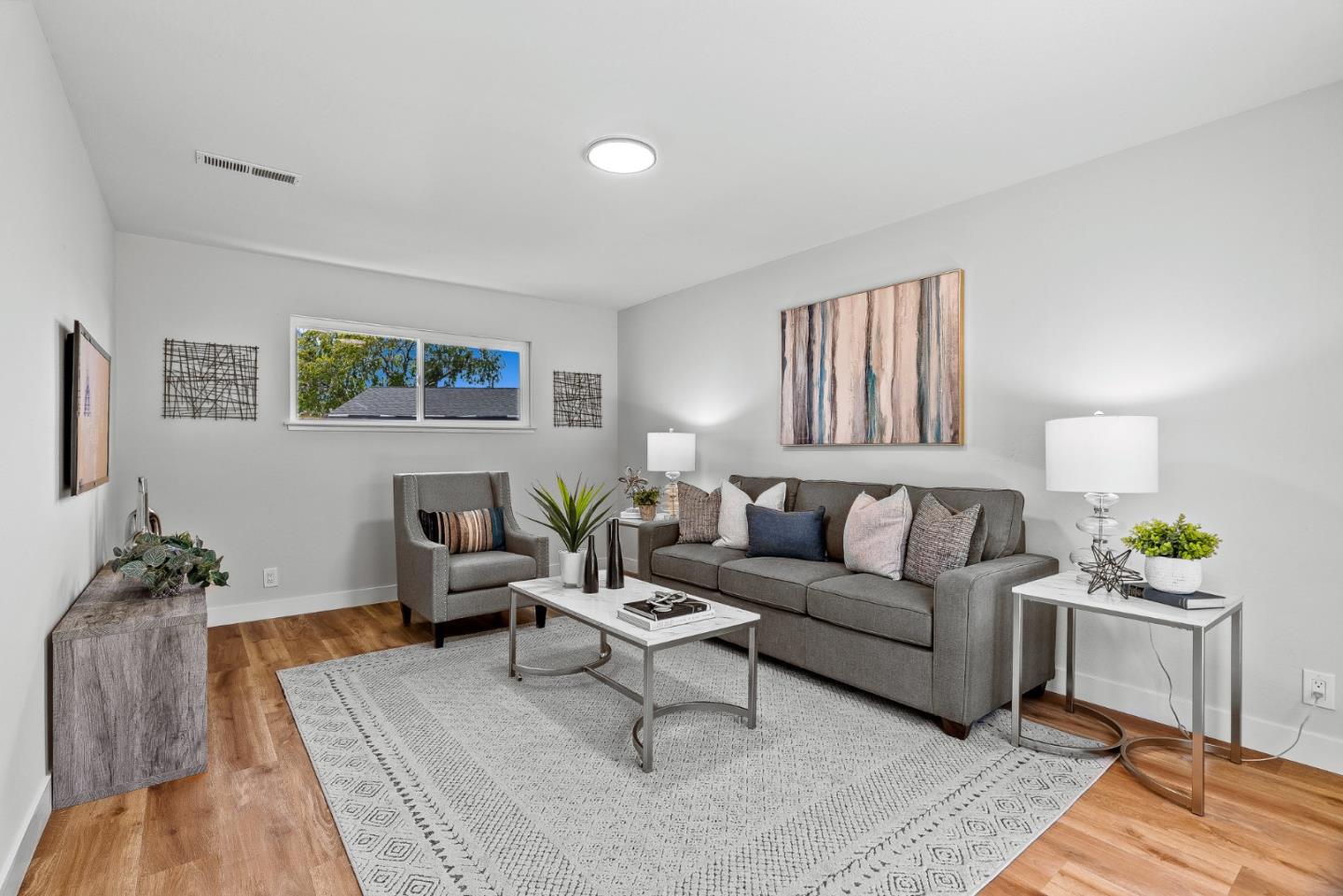 3763 Xavier Court Campbell, CA 95008 - Photo 17 of 41 a living room with furniture and a rug