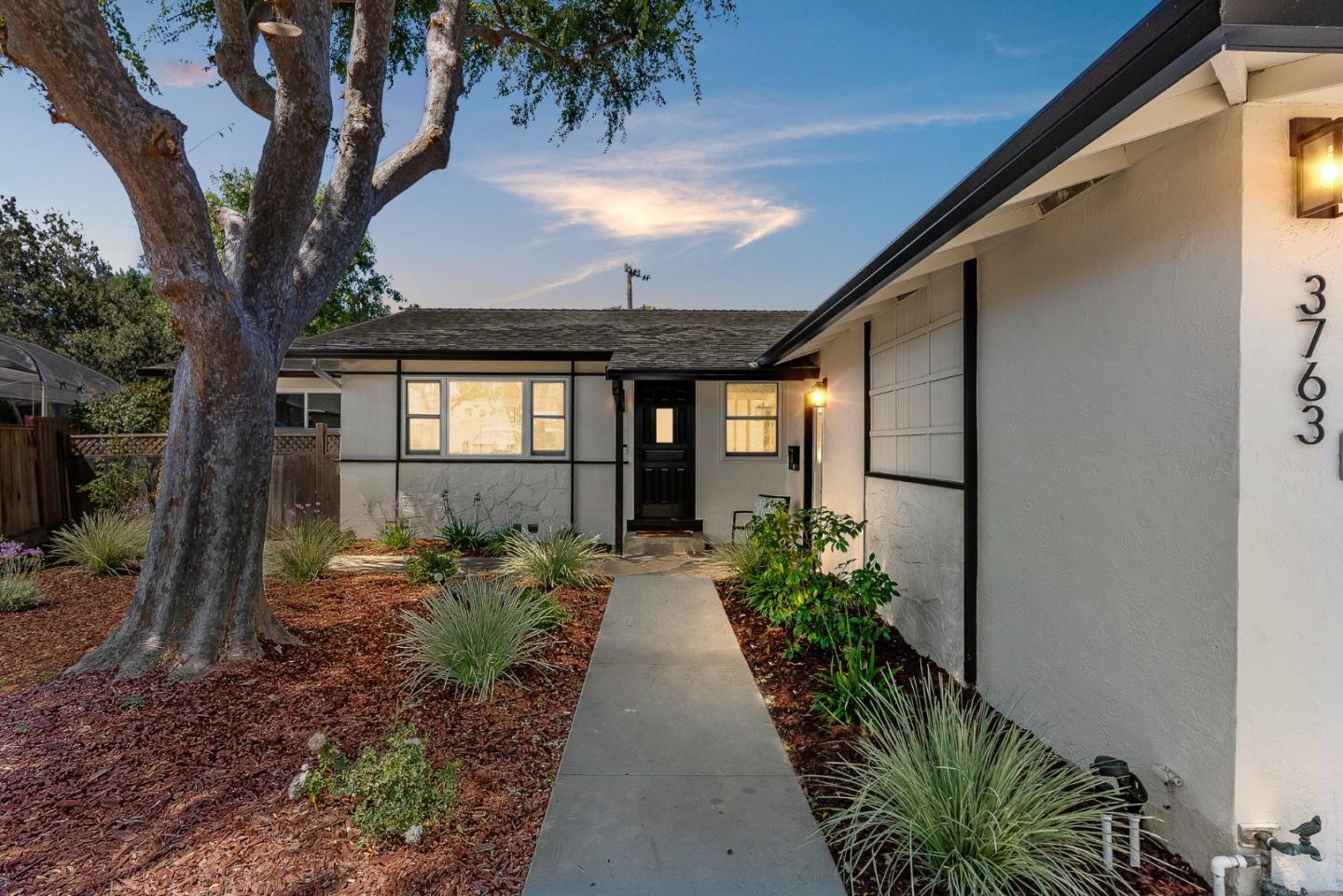 3763 Xavier Court Campbell, CA 95008 - Photo 2 of 41 a view of a house with potted plants