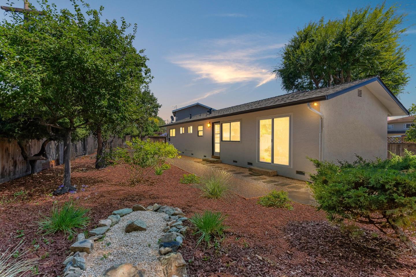 3763 Xavier Court Campbell, CA 95008 - Photo 28 of 41 a view of a backyard with plants and large tree