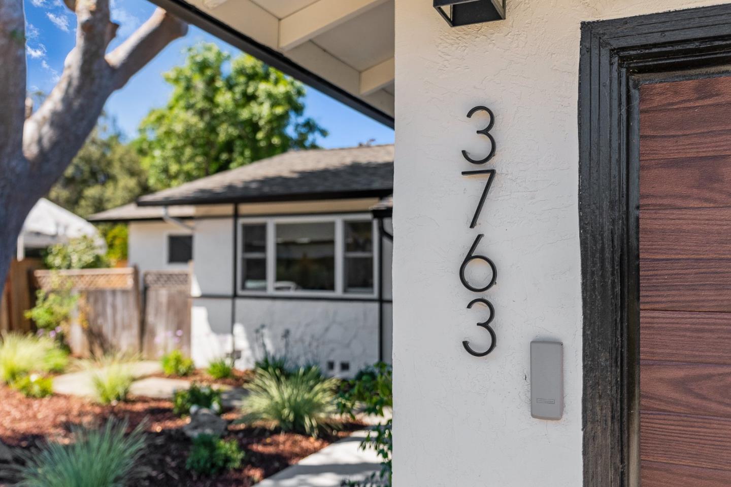3763 Xavier Court Campbell, CA 95008 - Photo 3 of 41 a front view of a house with a yard
