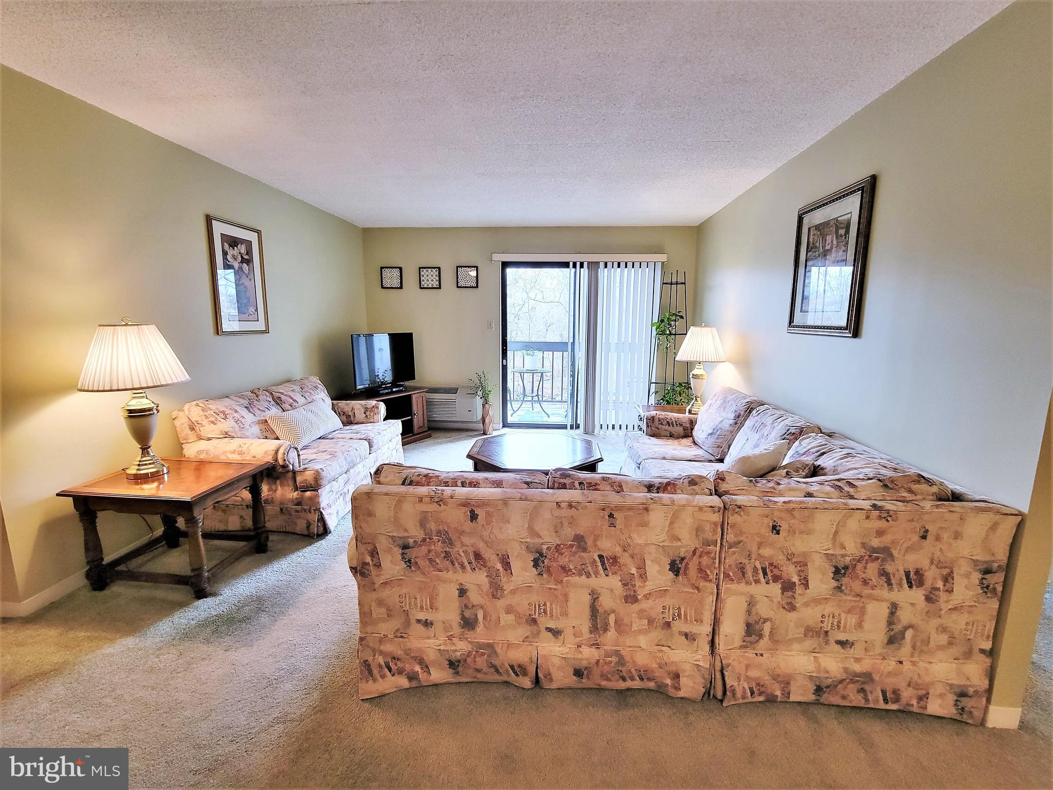 800 Avondale Road, Unit 3G Wallingford, PA 19086 - Photo 39 of 87 Living Room w/Sliders