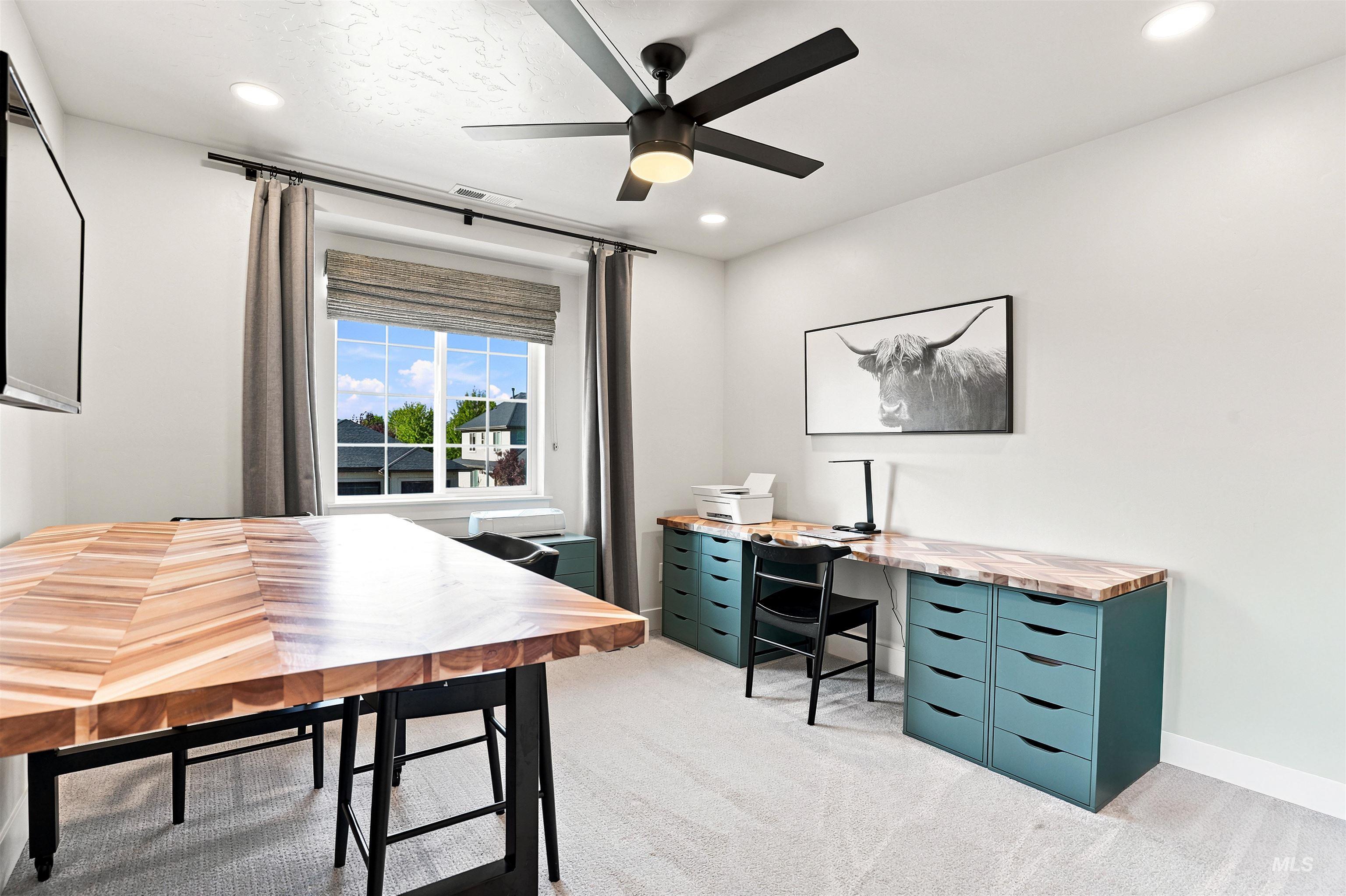 4323 West Ladle Rpds Drive Meridian, ID 83646 - Photo 36 of 49 Bright room featuring a multi-pane window, recessed lighting, and a ceiling fan