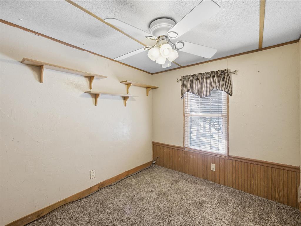 196 Perch Road Bowie, TX 76230 - Photo 22 of 33 a view of an empty room with a window
