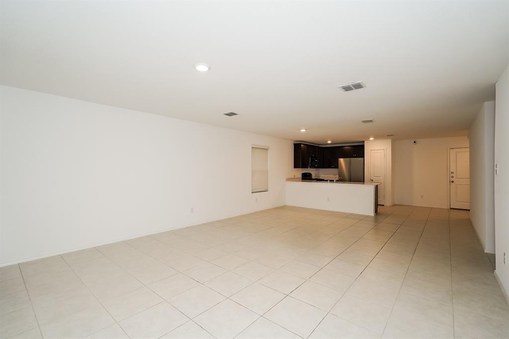 14841 Firerock Road Haslet, TX 76052 - Photo 6 of 18 a view of a kitchen with a sink