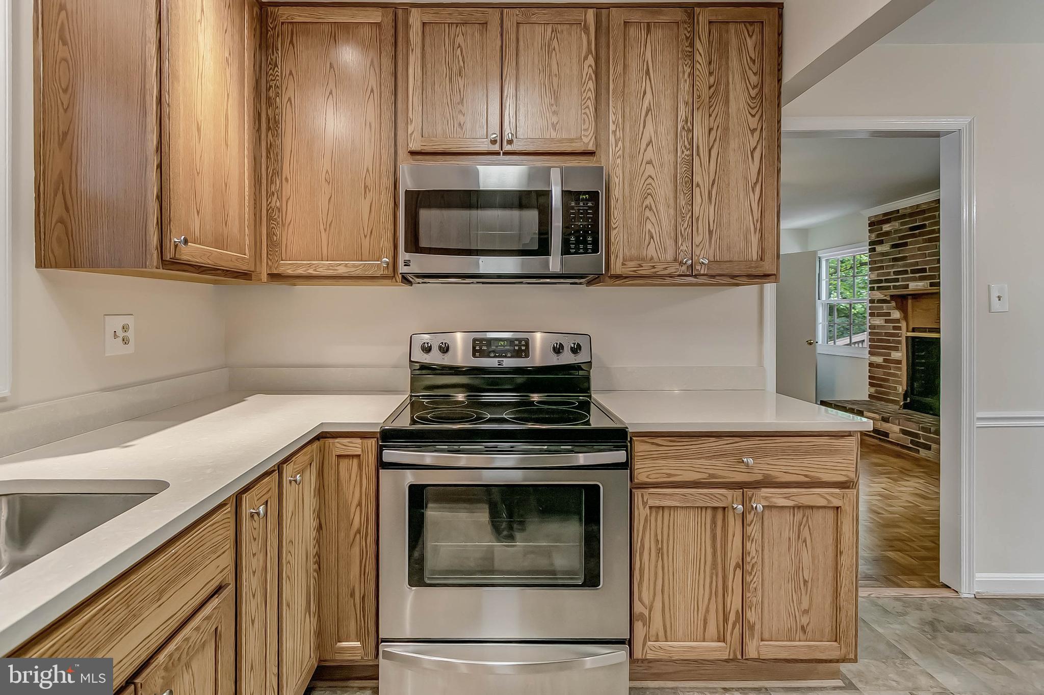 3229 Birchtree Lane Silver Spring, MD 20906 - Photo 13 of 44 Updated stove and microwave