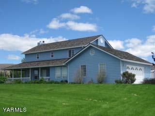 971 Sheep Co Road Selah, WA 98942 - Photo 1 of 44 a view of a back yard of the house