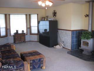 971 Sheep Co Road Selah, WA 98942 - Photo 5 of 44 a living room with furniture and a fireplace