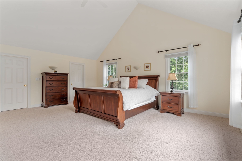 8 Stoneybrook Circle Andover, MA 01810 - Photo 17 of 37 a bedroom with a bed and a dresser