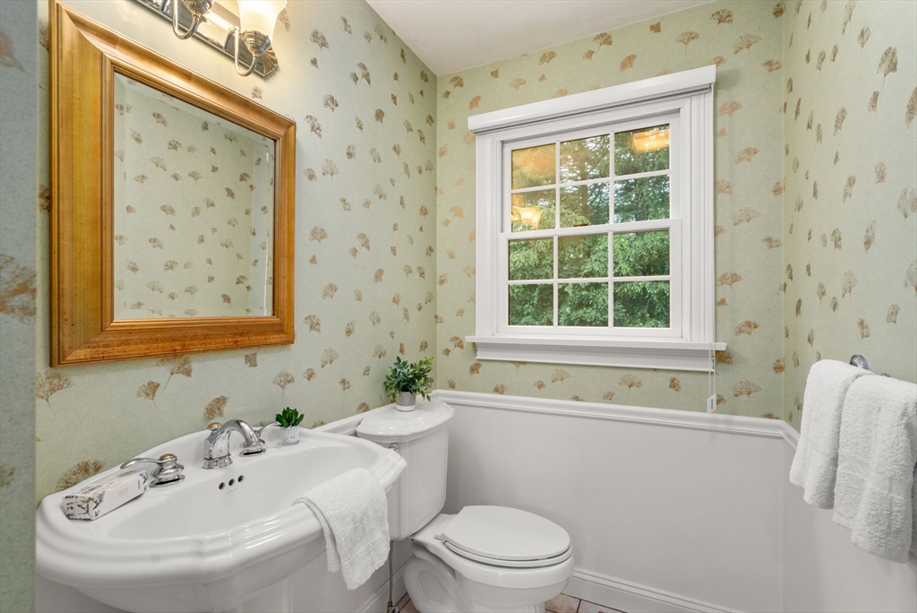 8 Stoneybrook Circle Andover, MA 01810 - Photo 28 of 37 a bathroom with a sink a toilet and a window