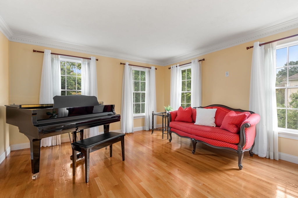 8 Stoneybrook Circle Andover, MA 01810 - Photo 8 of 37 a living room with furniture and a window
