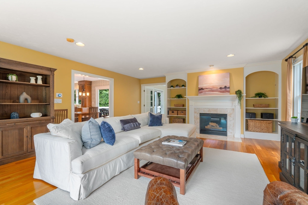 8 Stoneybrook Circle Andover, MA 01810 - Photo 9 of 37 a living room with furniture and a fireplace