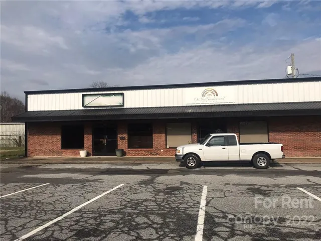 a car parked in front of a building