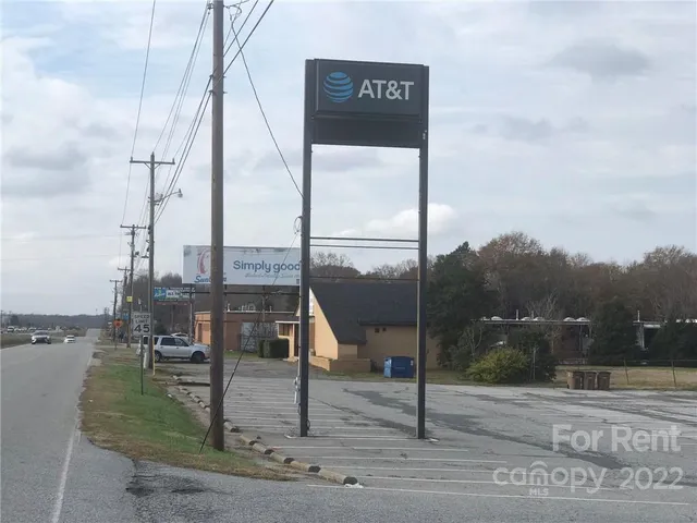 a sign board with ocean view