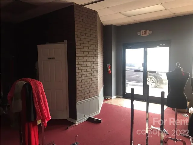 a view of livingroom with furniture and window