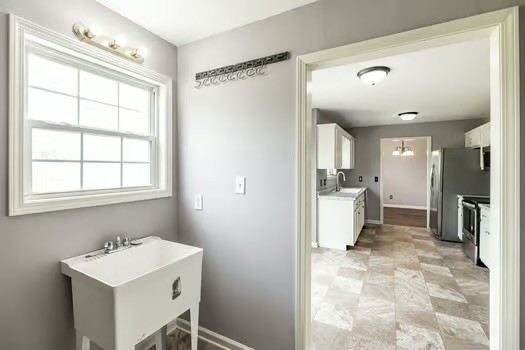 2029 Copper Kettle Circle Pleasant View, TN 37146 - Photo 32 of 58 a bathroom with a sink a toilet and a mirror