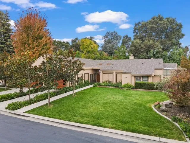 front view of a house with a yard