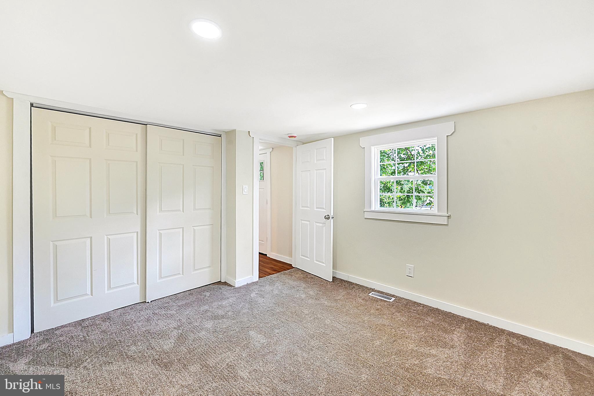 215 Freysville Road York, PA 17406 - Photo 13 of 19 an empty room with windows and closet