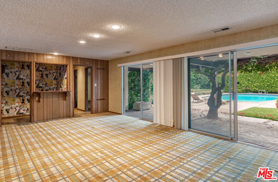 540 Adelaide Drive Santa Monica, CA 90402 - Photo 17 of 45 a view of a room with a large bed