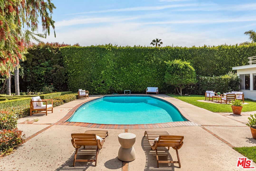 540 Adelaide Drive Santa Monica, CA 90402 - Photo 21 of 45 a view of swimming pool with chairs