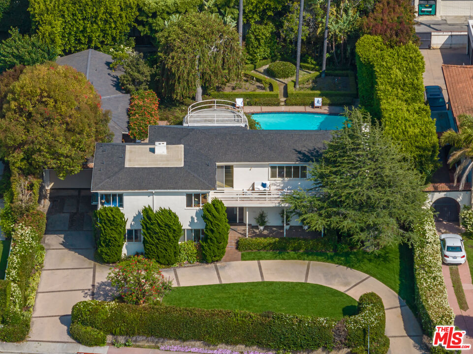 540 Adelaide Drive Santa Monica, CA 90402 - Photo 37 of 45 an aerial view of a house with a yard and large trees