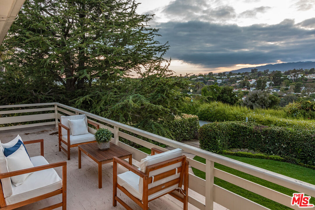 540 Adelaide Drive Santa Monica, CA 90402 - Photo 39 of 45 a view of a roof deck with couches and sky view