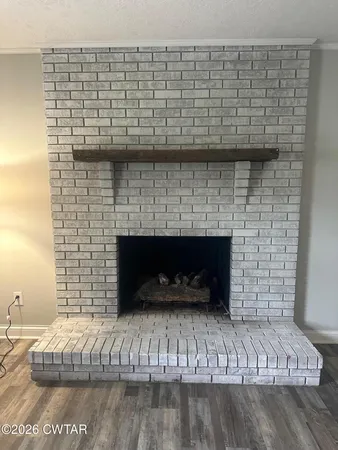 a living room with a fireplace