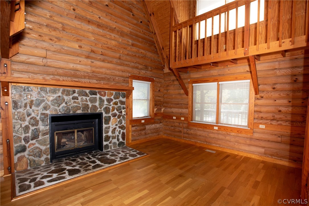 2526 Harris Creek Road Prospect, VA 23960 - Photo 7 of 50 a view of an empty room with wooden floor fireplace and a window