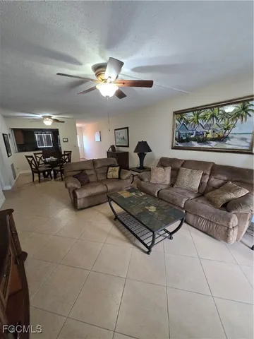 a workspace with furniture and a window