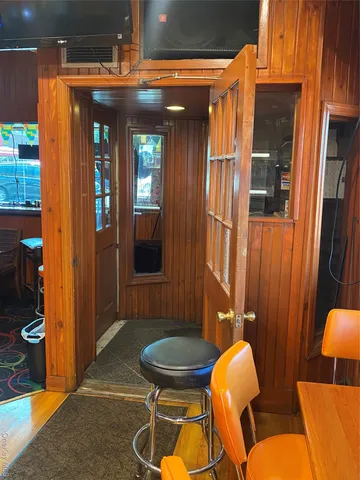 a view of a chairs and table in the patio