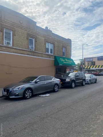 a car parked in front of a house