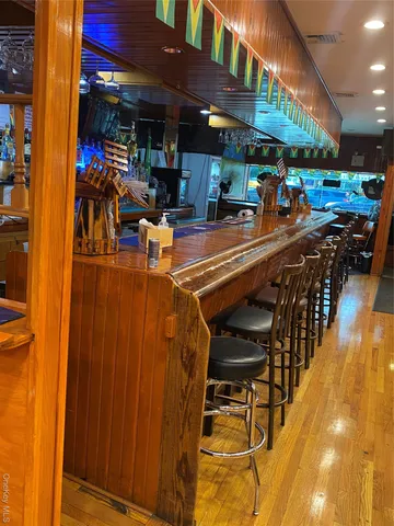 a view of a chairs and table in the patio