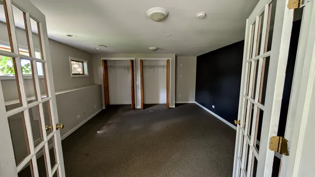 an empty room with windows