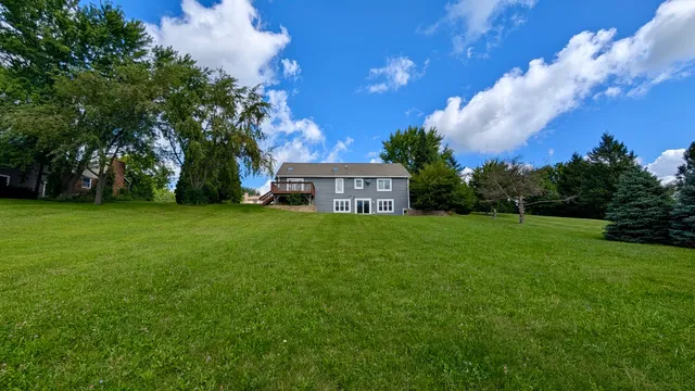 a brick house with a yard