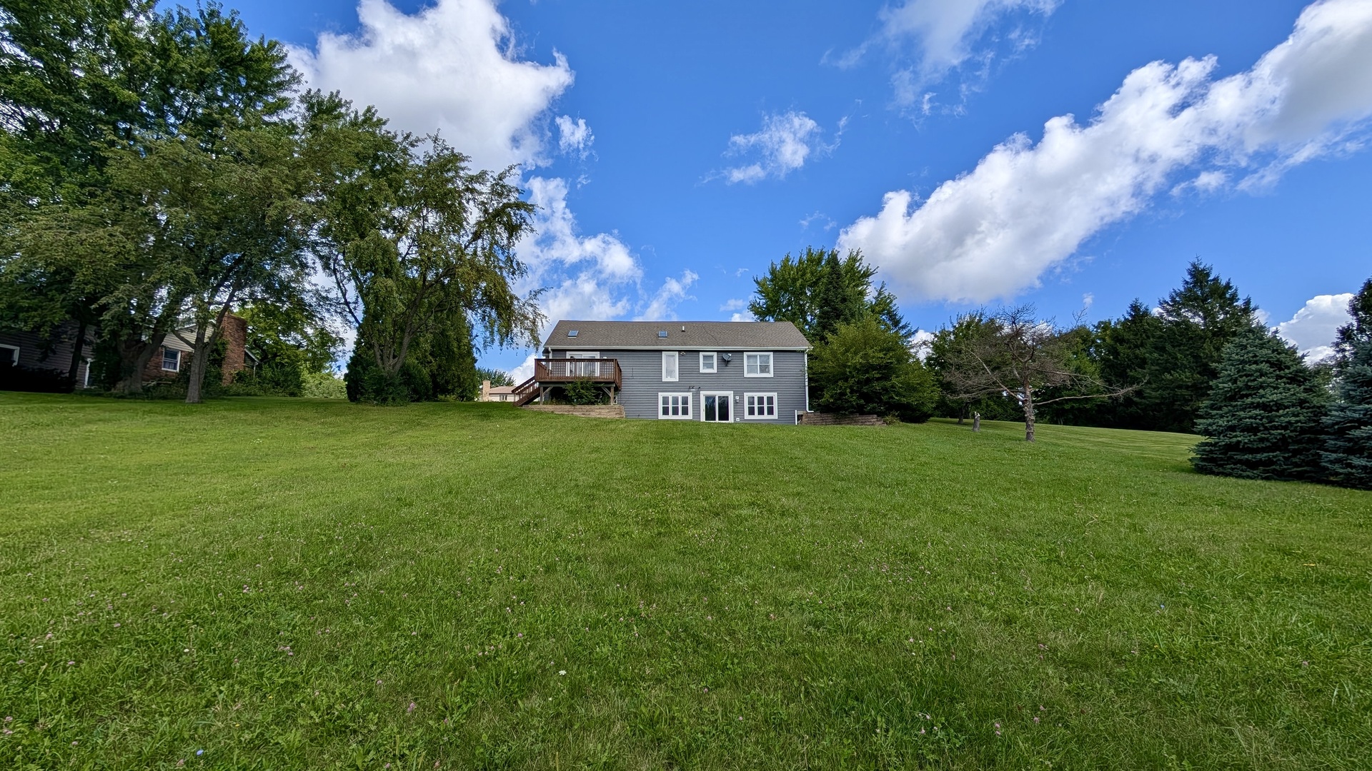 11617 Hawthorne Way Huntley, IL 60142 - Photo 40 of 50 a view of a house with a yard
