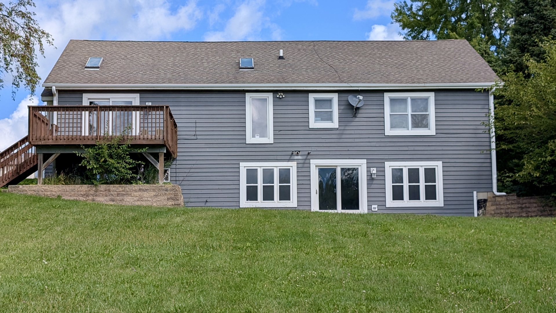 11617 Hawthorne Way Huntley, IL 60142 - Photo 41 of 50 a brick house with a yard