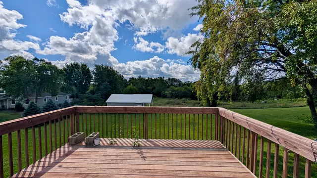 a backyard of a house with lots of green space