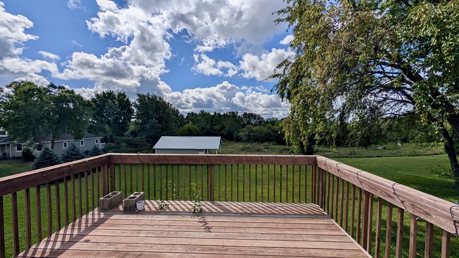 11617 Hawthorne Way Huntley, IL 60142 - Photo 46 of 50 a view of a two chairs and a table in the balcony