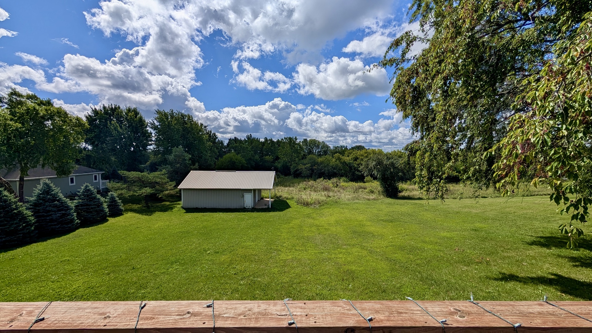 11617 Hawthorne Way Huntley, IL 60142 - Photo 47 of 50 a backyard of a house with lots of green space
