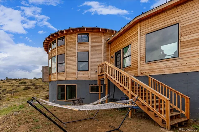 a view of a house with a big yard